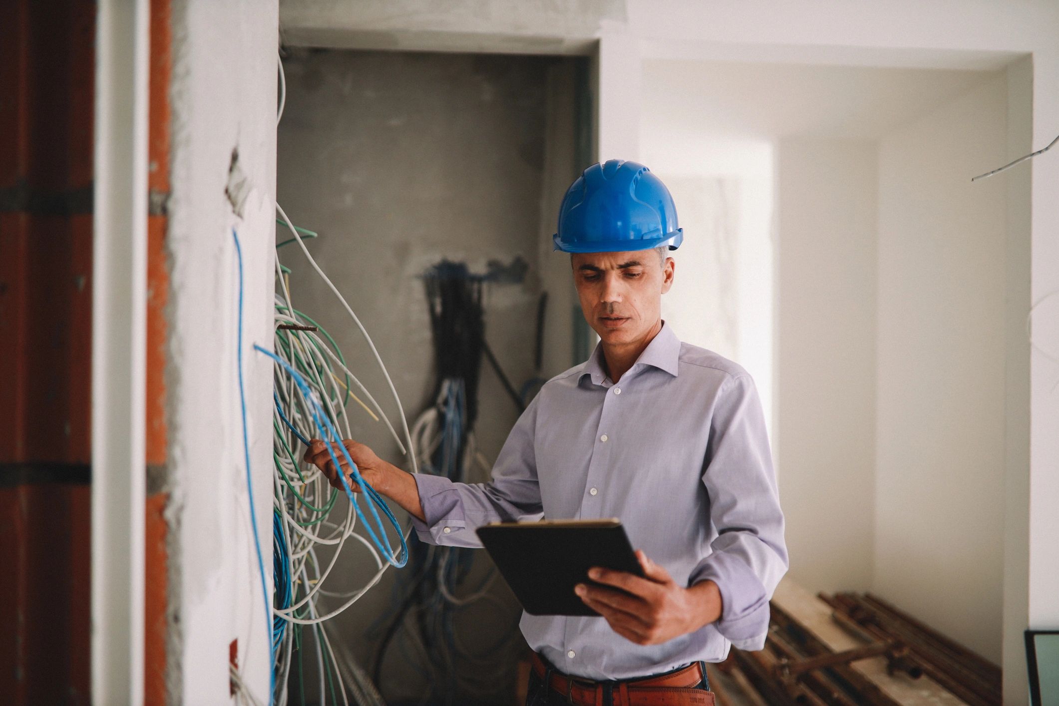 Electrician inspecting a job site