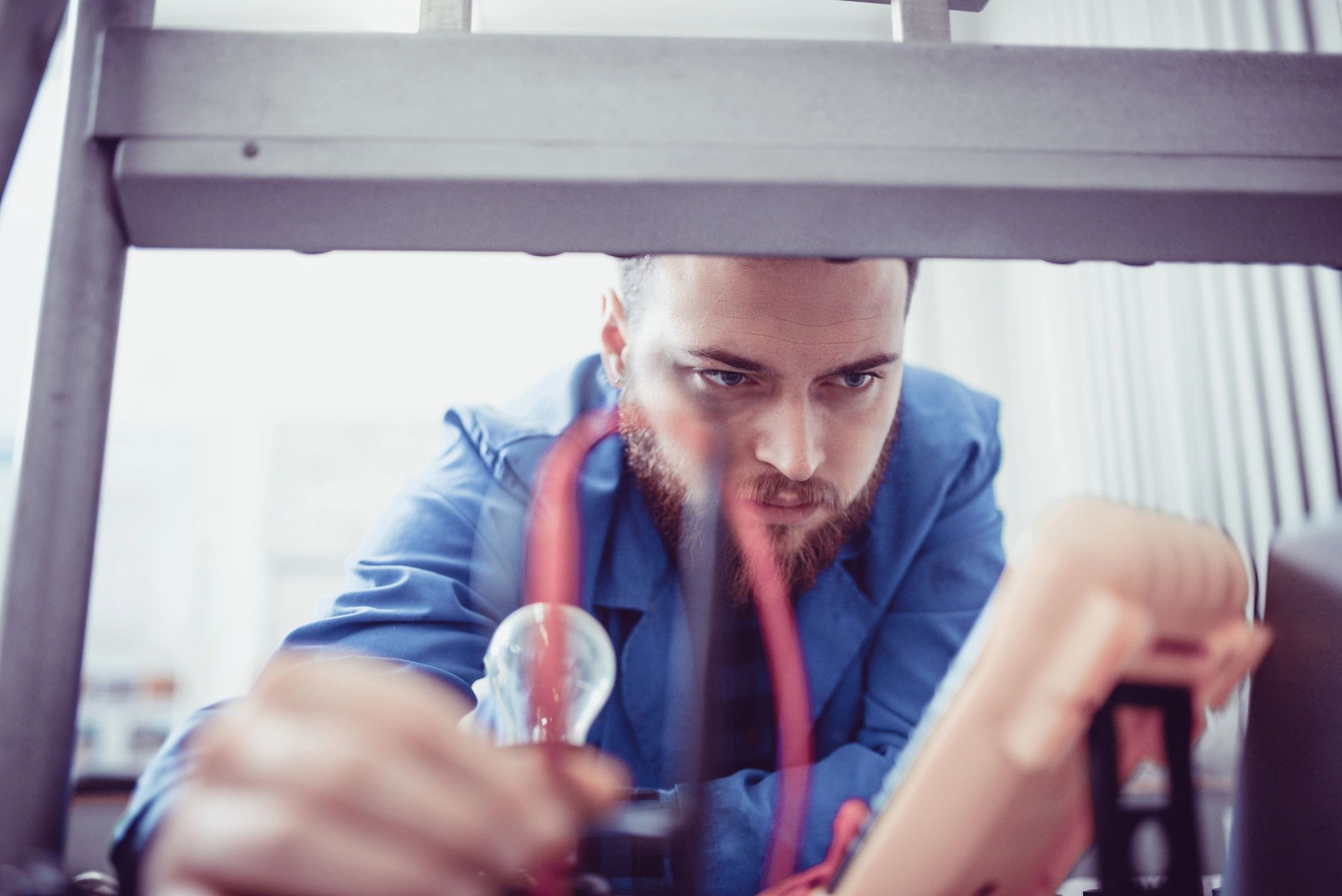 Engineer measuring and planning work in an office